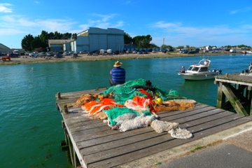Veel vis en vissers in Courseulles sur Mer